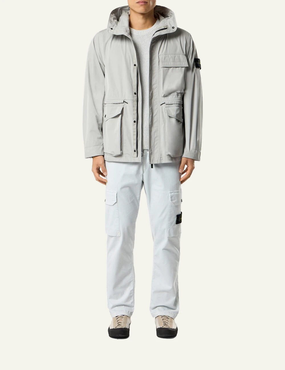 Stone Island cargo trousers in sky blue with side pockets and logo patch front full body view