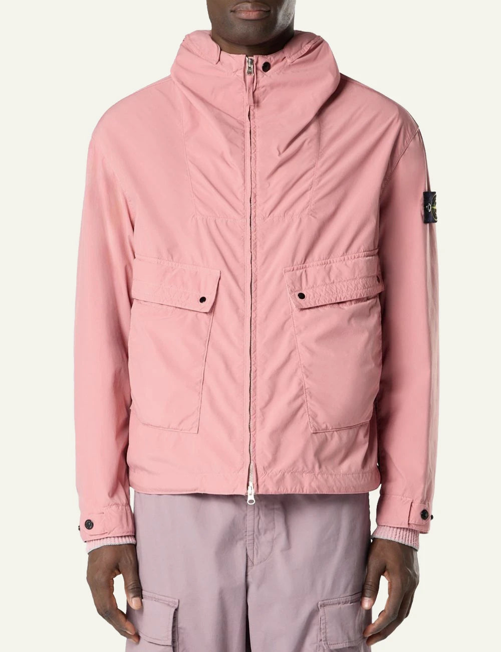 Stone Island hooded jacket in pink with front pockets and logo patch front model view