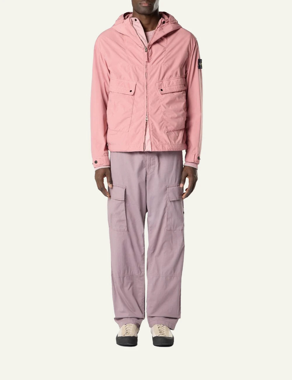 Stone Island hooded jacket in pink with front pockets and logo patch front full body view