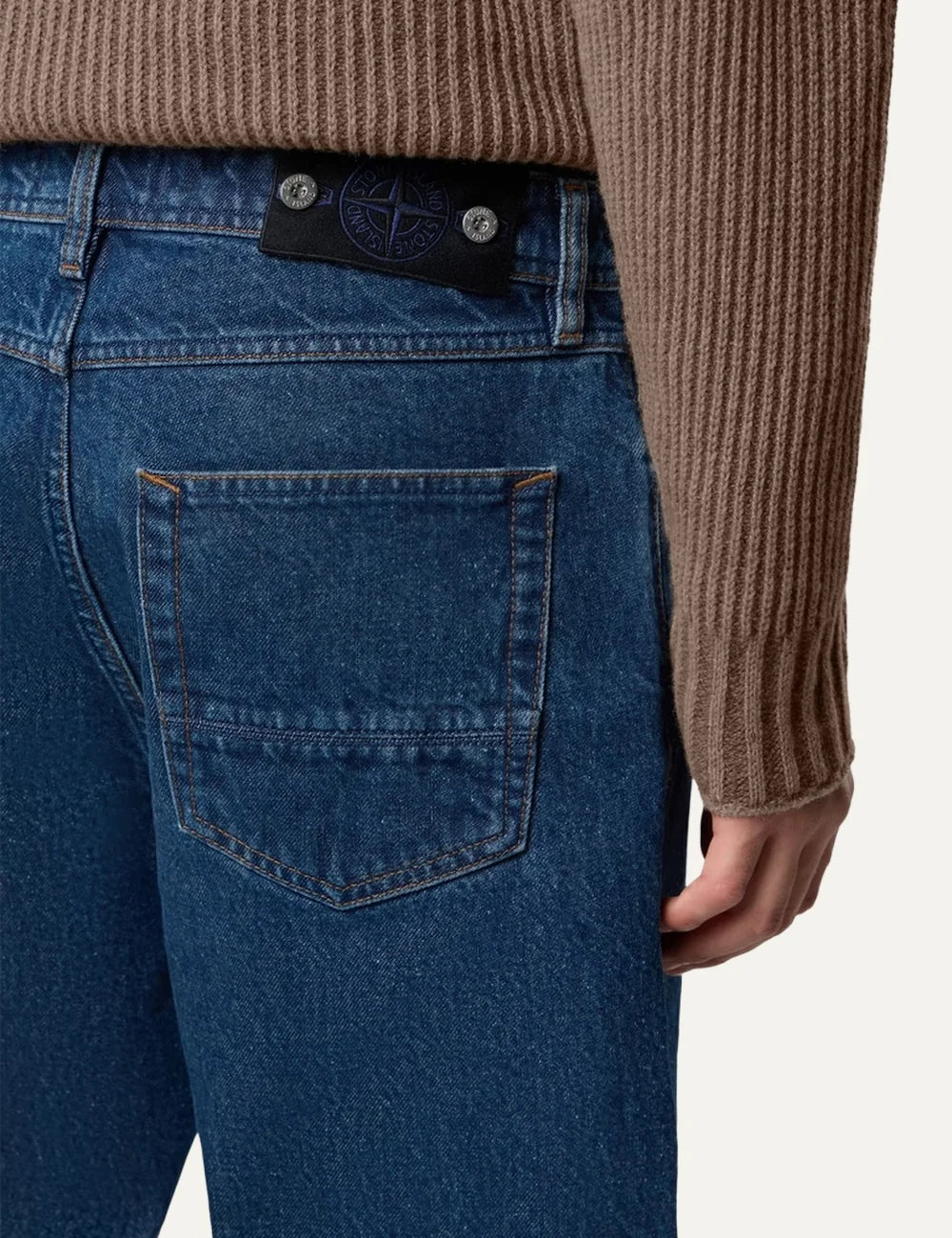 Stone Island men's blue regular straight fit jeans in medium grainy wash denim with five-pocket design and faded finish back
