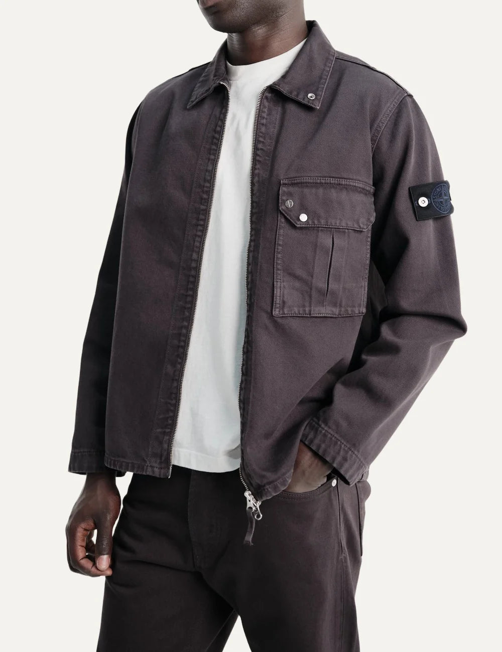 Stone Island men's dark burgundy zip-up overshirt with pointed collar, flap chest pocket, faded finish and signature sleeve badgemodel