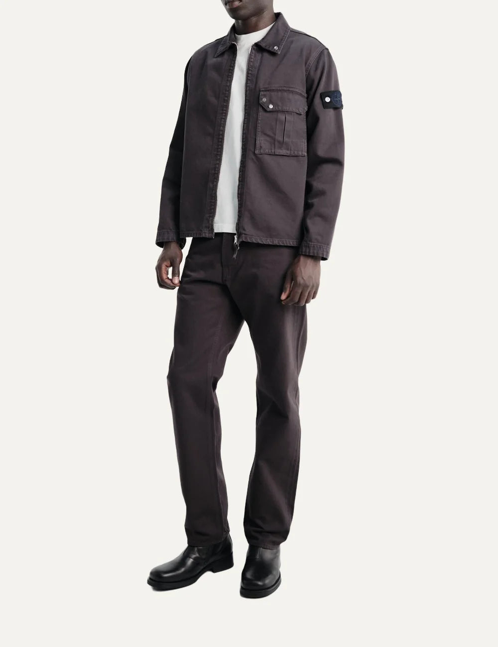 Stone Island men's dark burgundy zip-up overshirt with pointed collar, flap chest pocket, faded finish and signature sleeve badge full body
