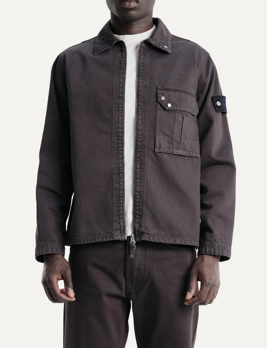 Stone Island men's dark burgundy zip-up overshirt with pointed collar, flap chest pocket, faded finish and signature sleeve badge.