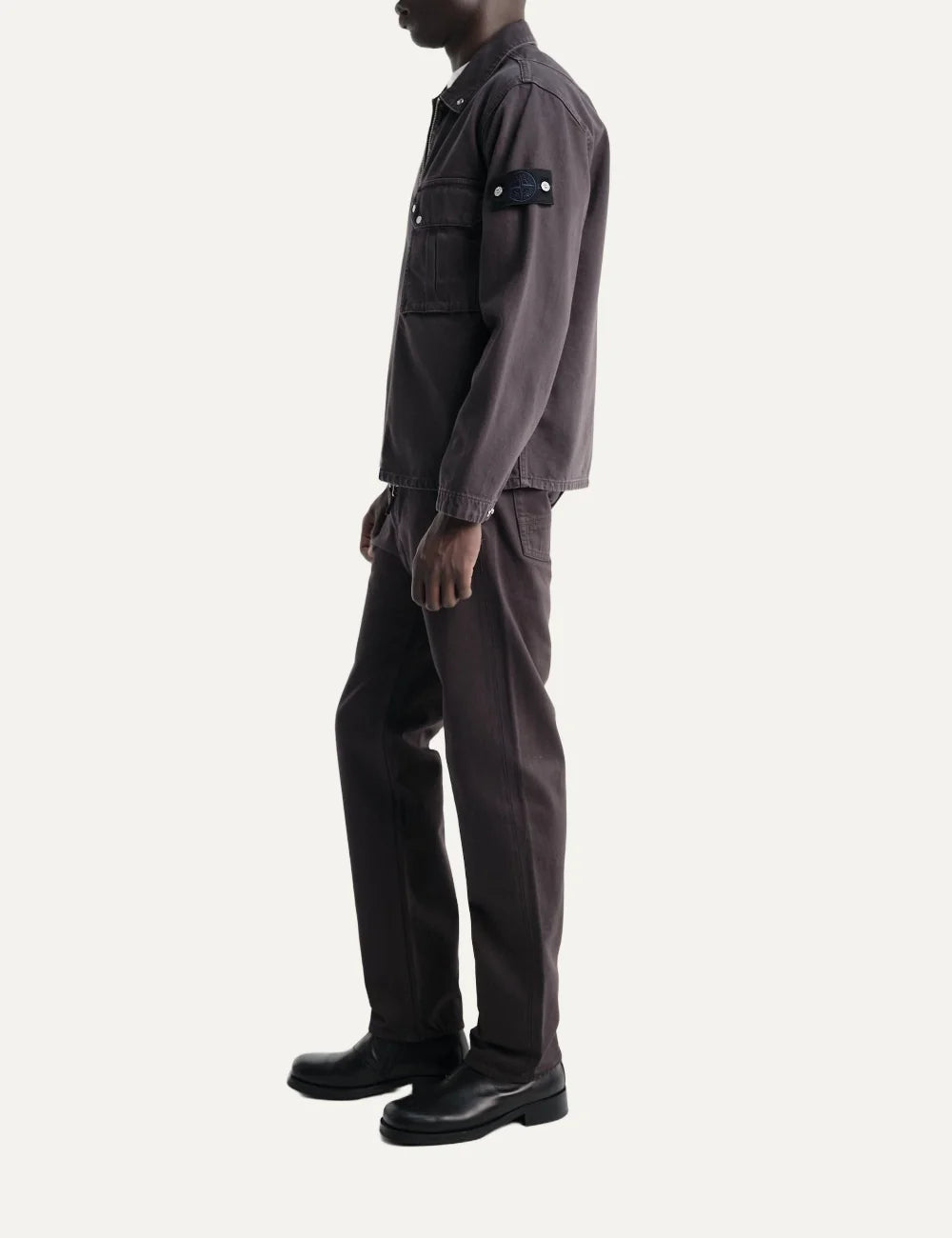 Stone Island men's dark burgundy zip-up overshirt with pointed collar, flap chest pocket, faded finish and signature sleeve badge side