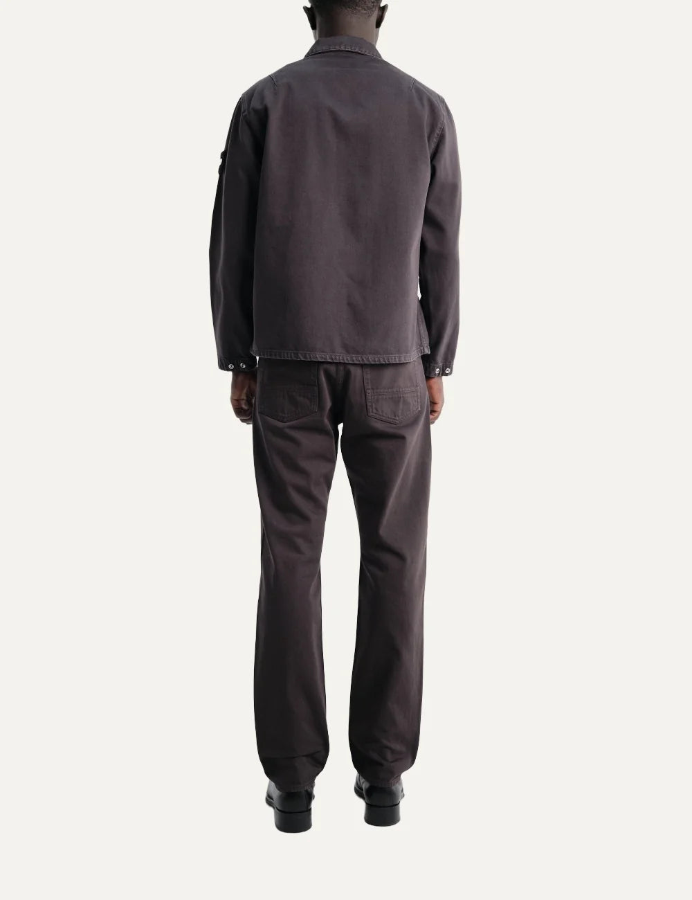 Stone Island men's dark burgundy zip-up overshirt with pointed collar, flap chest pocket, faded finish and signature sleeve badge back