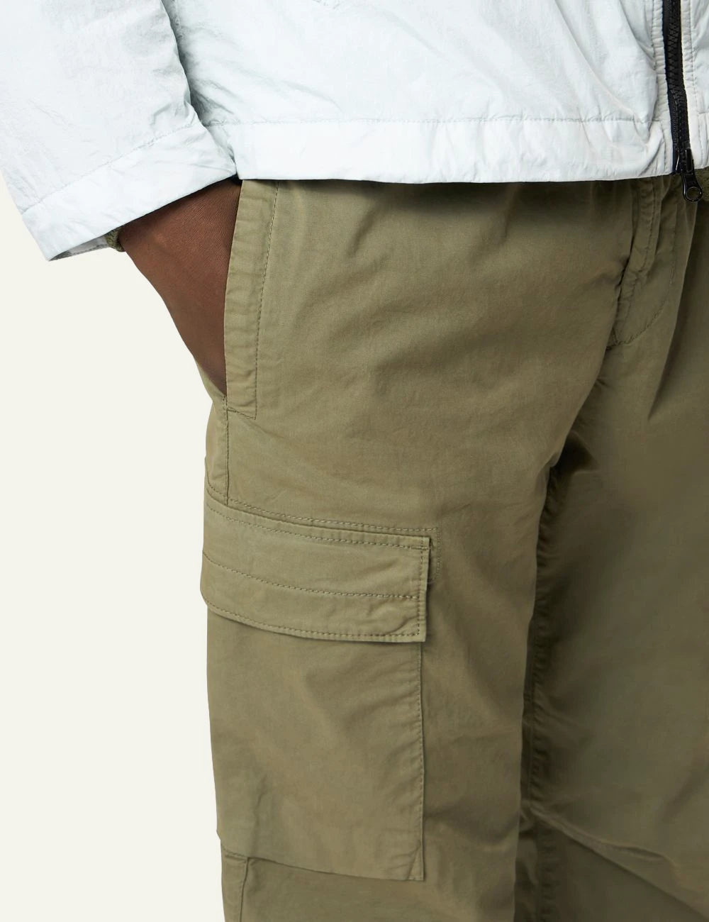Stone Island stretch organic cotton twill cargo pants military green with badge front pocket view