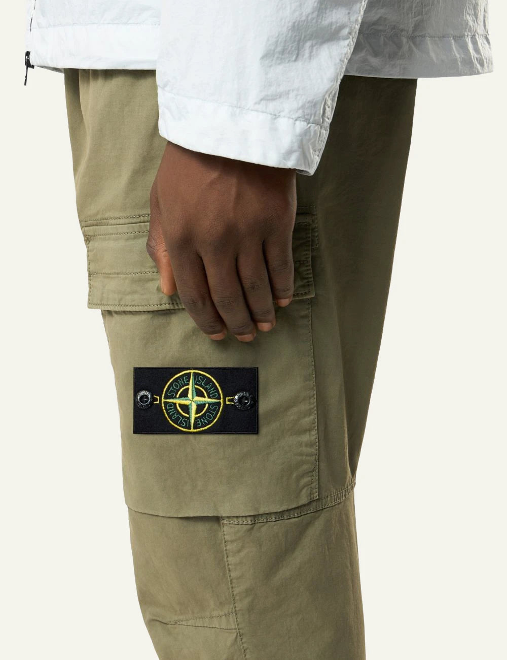 Stone Island stretch organic cotton twill cargo pants military green with badge front logo view