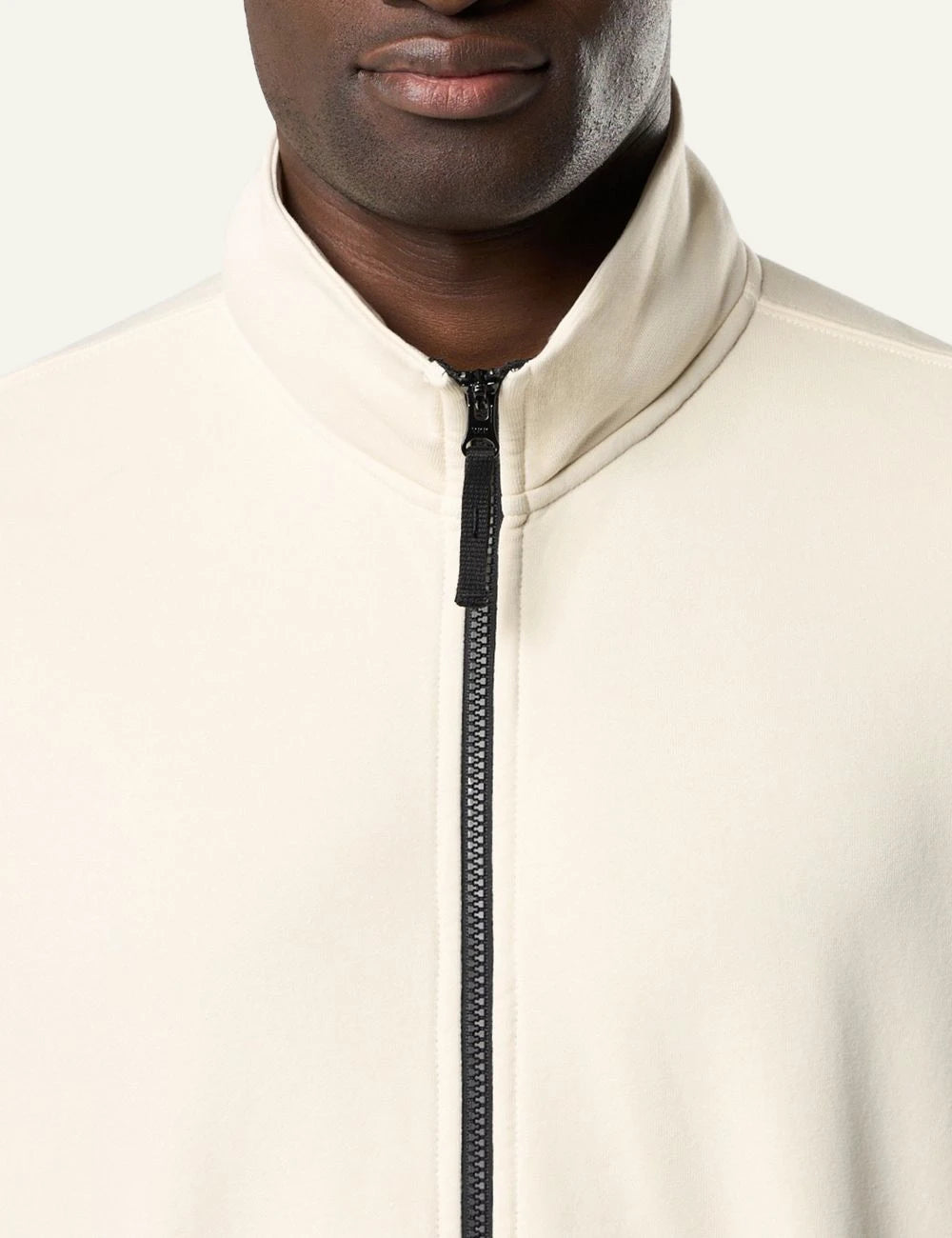 Stone Island track jacket ivory cotton fleece zip front compass logo sleeve detail front detail view