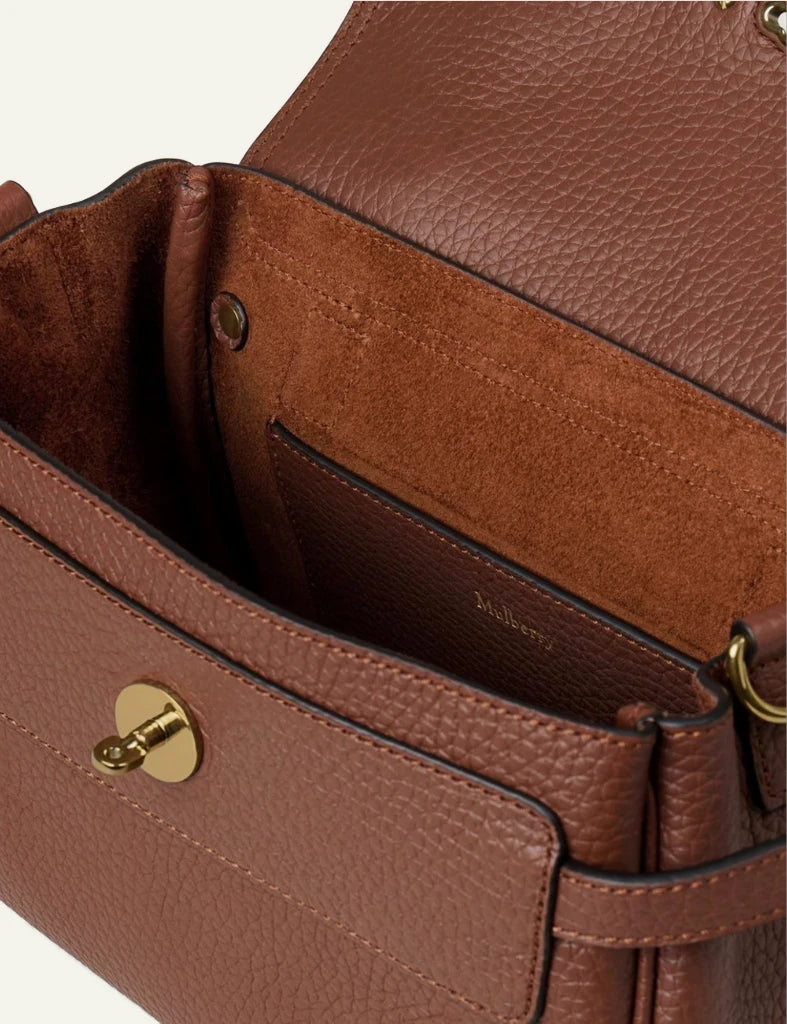 brown leather top handle bag gold hardware top view