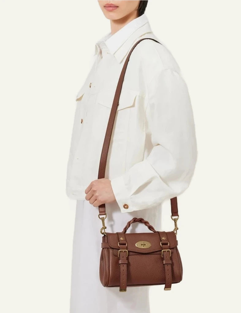 brown leather top handle bag gold hardware front model view