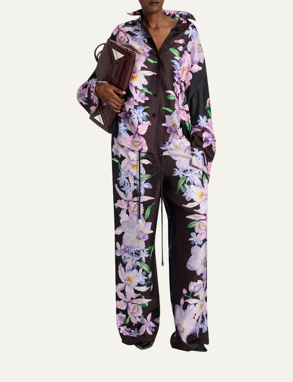 The Attico black silk wide leg pants with tropical floral print for women front view