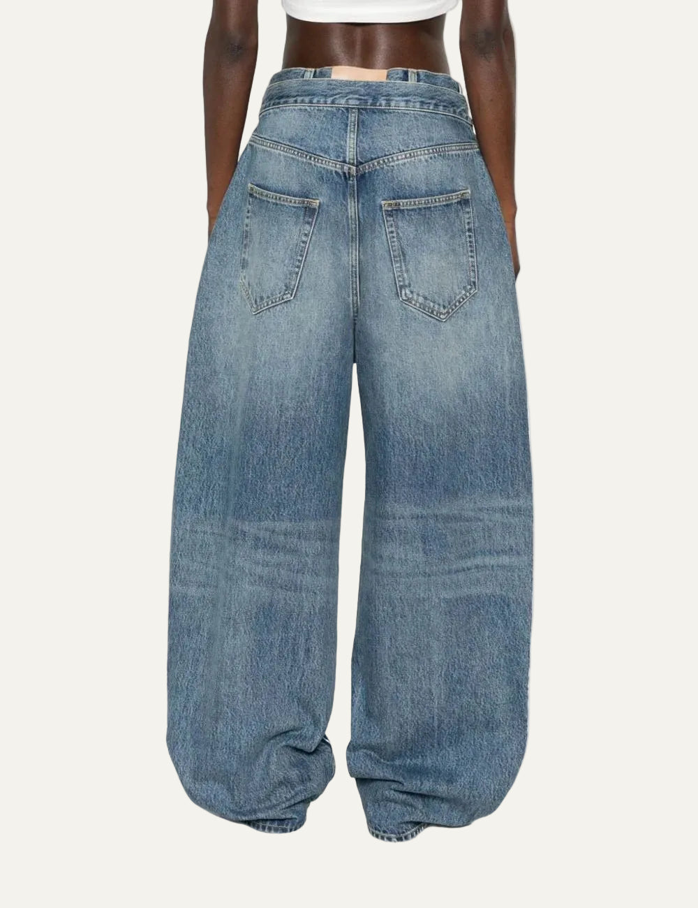 The Attico light blue barrel jeans for women back view