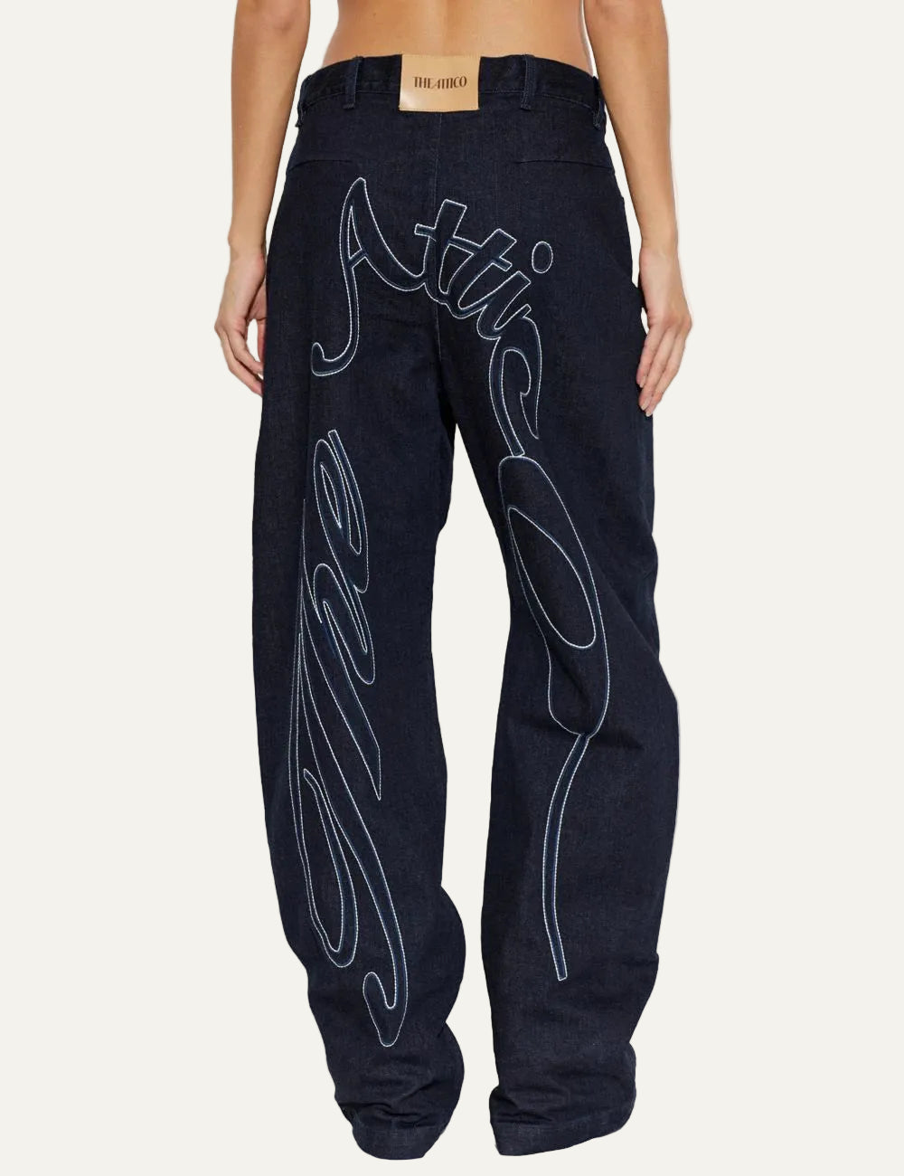 The Attico navy blue wide leg jeans with embroidered logo for women back view