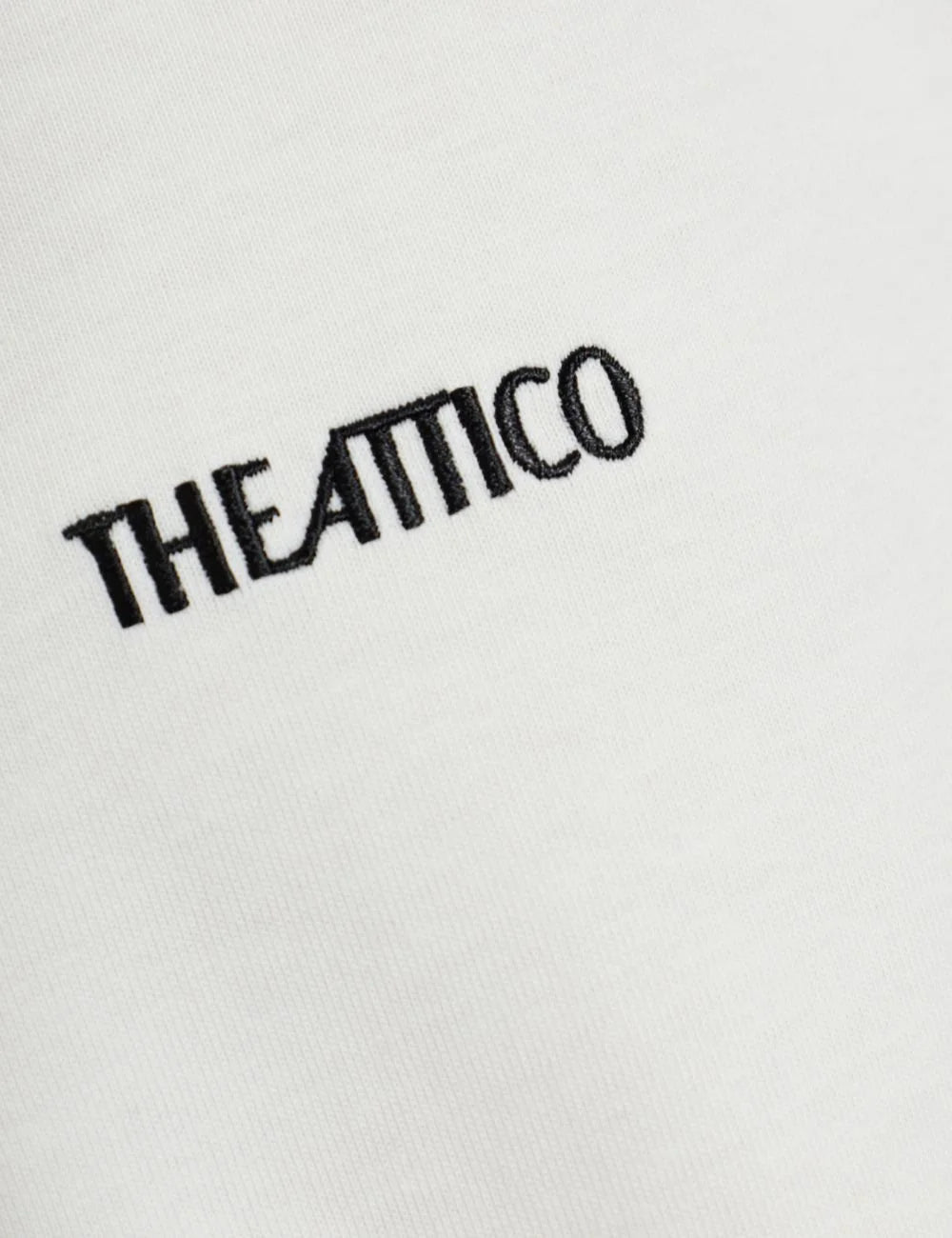 The Attico white oversized cotton t-shirt with black embroidered logo for women logo view