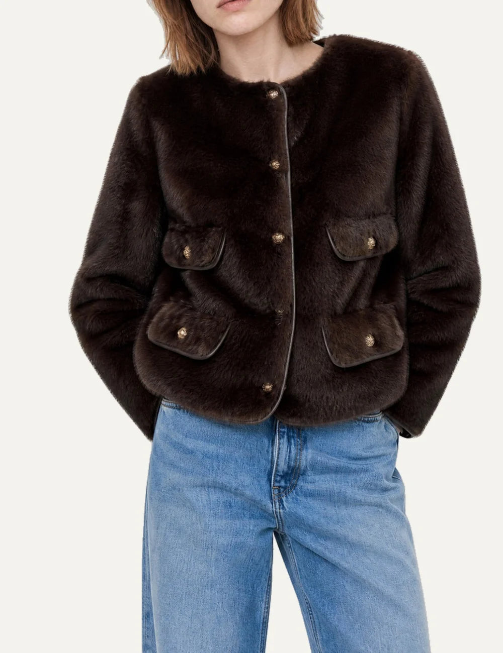 The Kooples women's dark brown faux fur jacket with gold-tone buttons, round neckline and flap pockets model