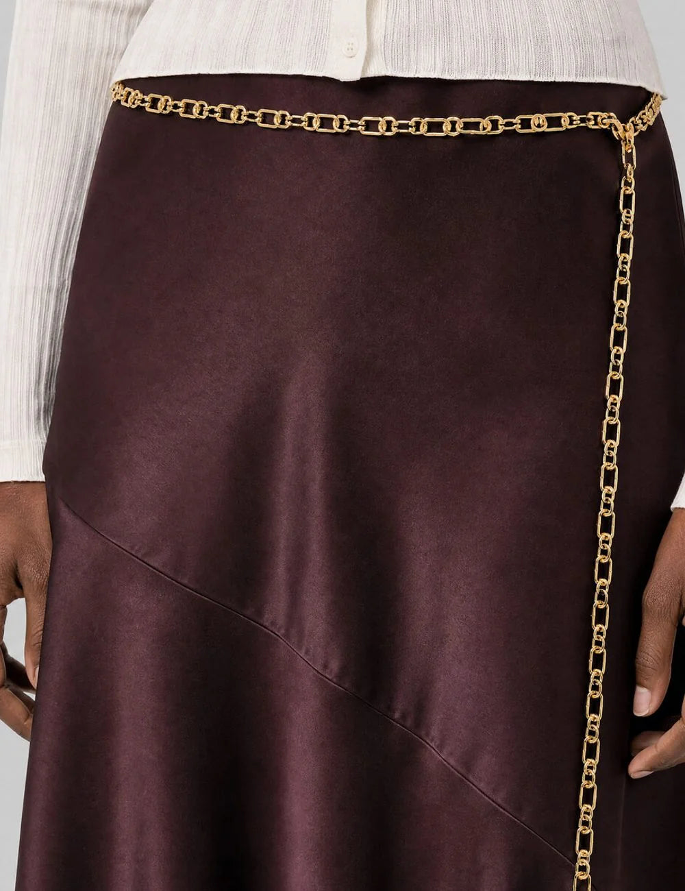 The Kooples women's burgundy satin midi skirt with removable gold chain belt detail