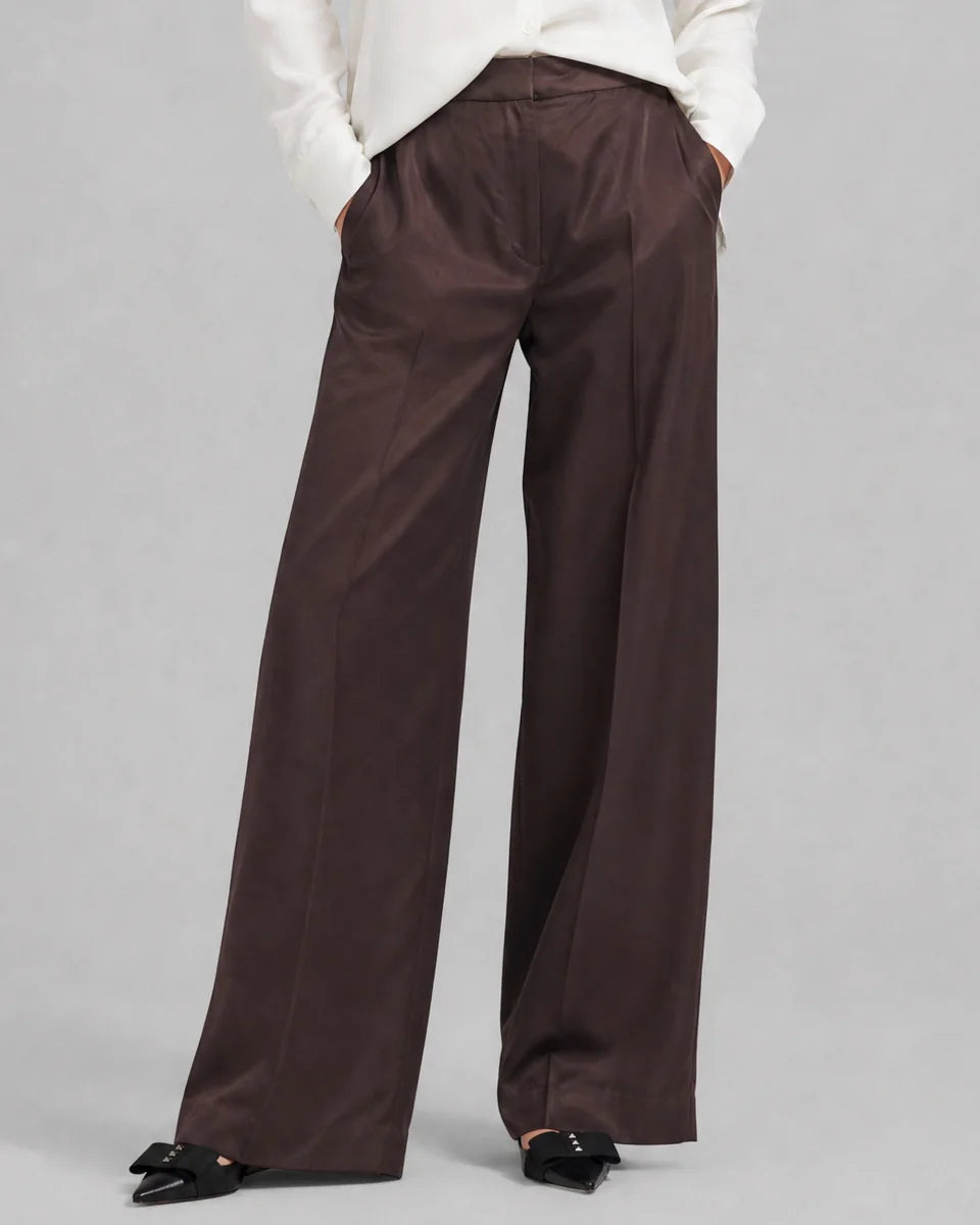 The Kooples women's dark brown satin wide-leg trousers with mid-rise waist, semi-elasticated waistband, side pockets and fluid silhouette model