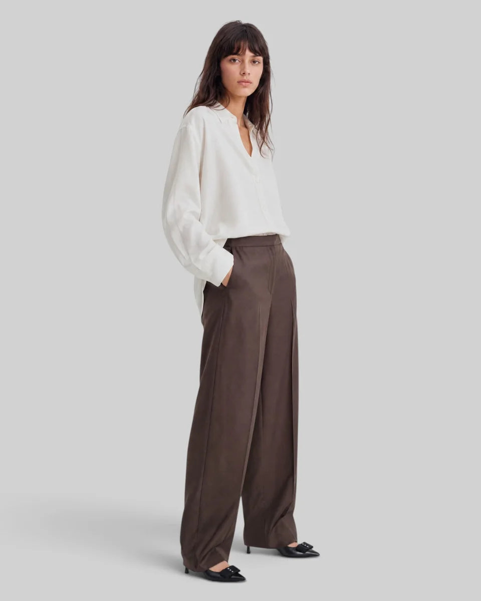 The Kooples women's dark brown satin wide-leg trousers with mid-rise waist, semi-elasticated waistband, side pockets and fluid silhouette side