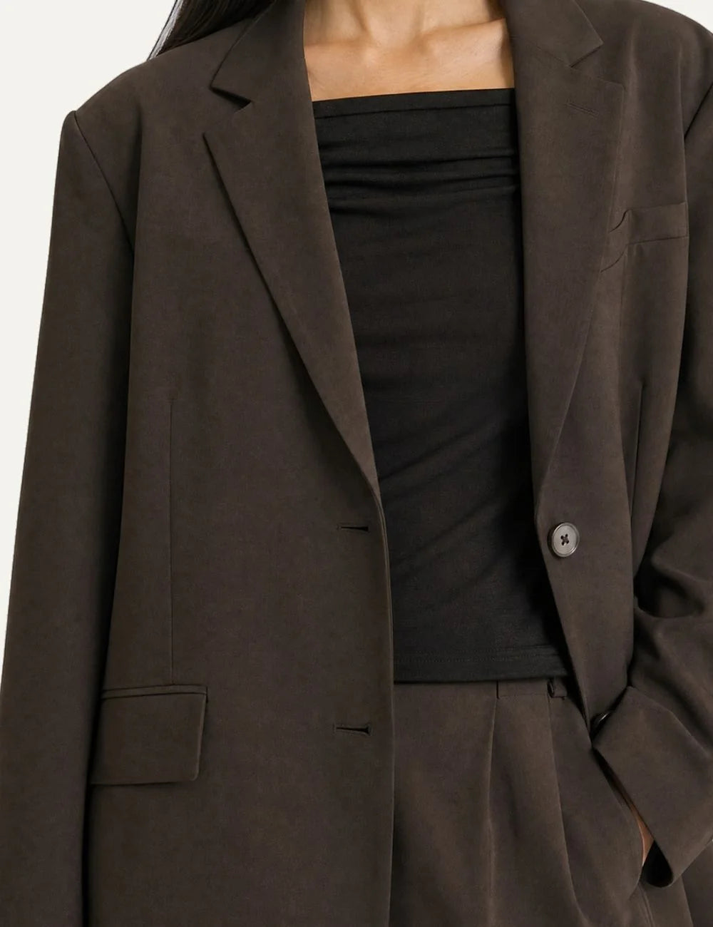 The Kooples women's dark brown oversized wool blazer with notched lapels, two-button closure, long sleeves and flap pockets detail