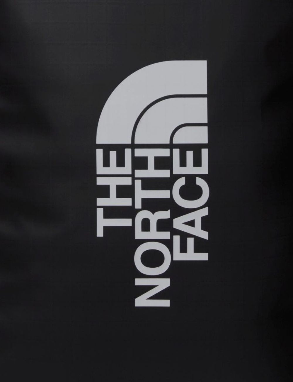 The North Face Base Camp Voyager roller suitcase black front side view logo handle detail view