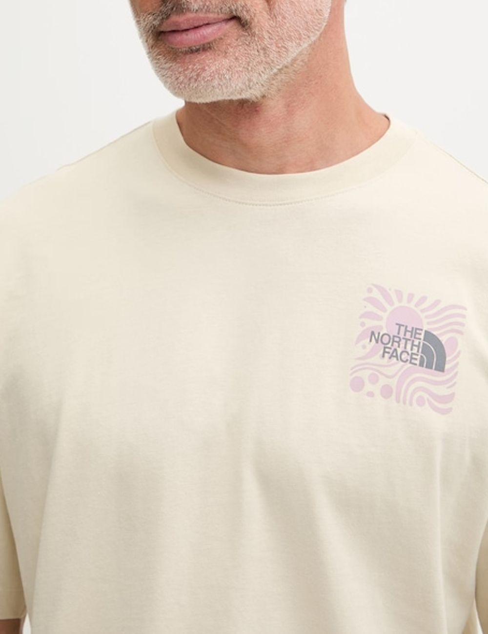 The North Face beige graphic tee front model