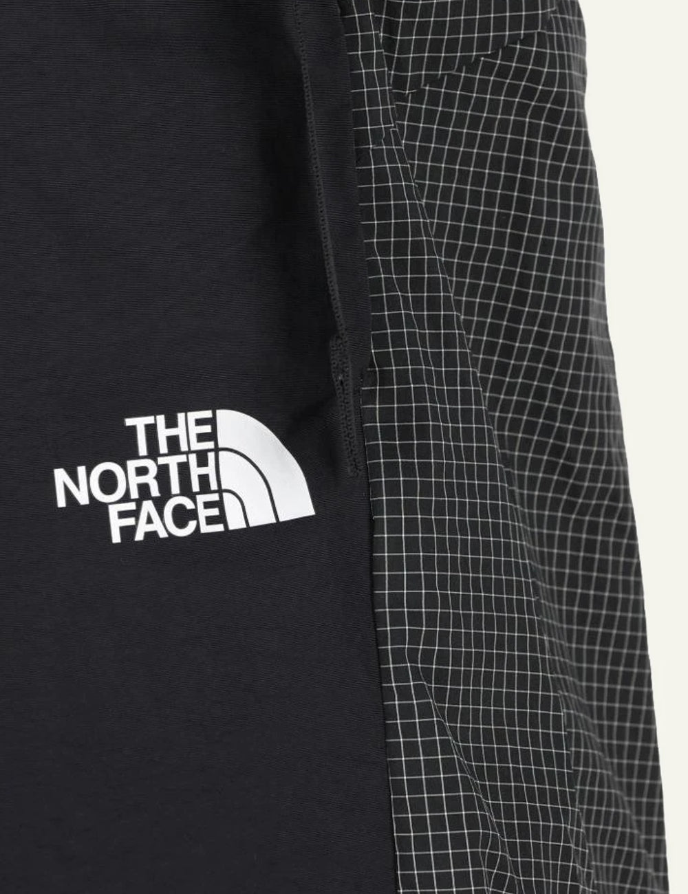 The North Face black nylon shorts belted relaxed fit lightweight outdoor front logo detail view