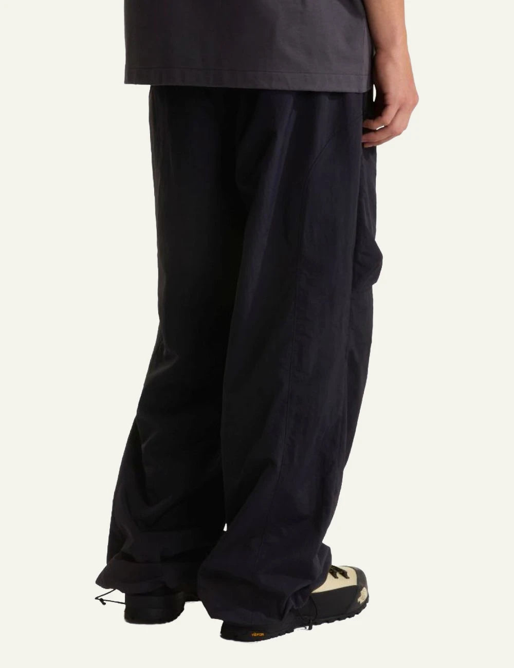 The North Face wide leg nylon pants black relaxed fit adjustable hem back view