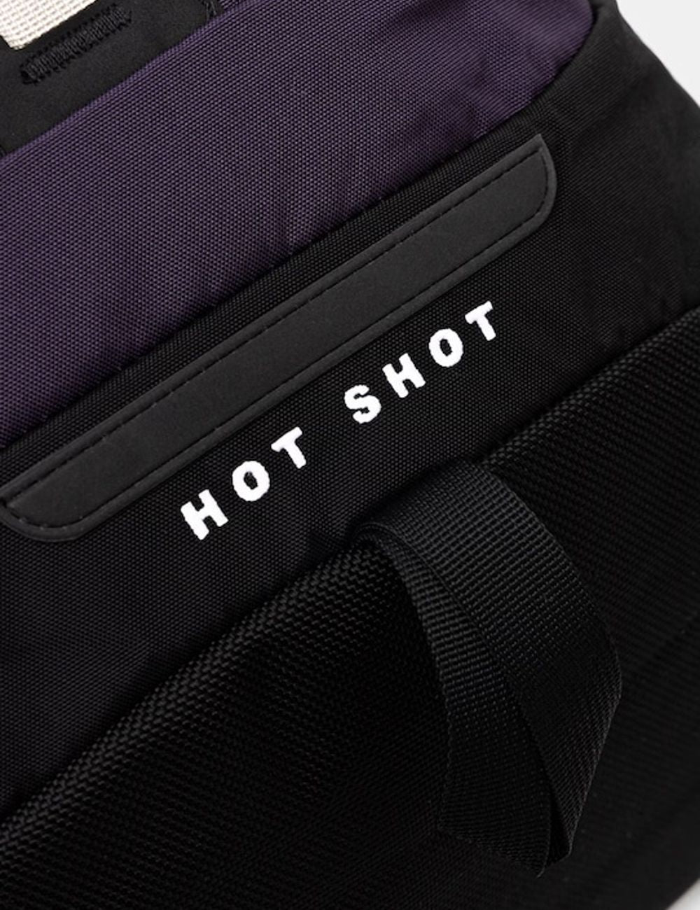 The North Face Hot Shot backpack purple grey front detail view