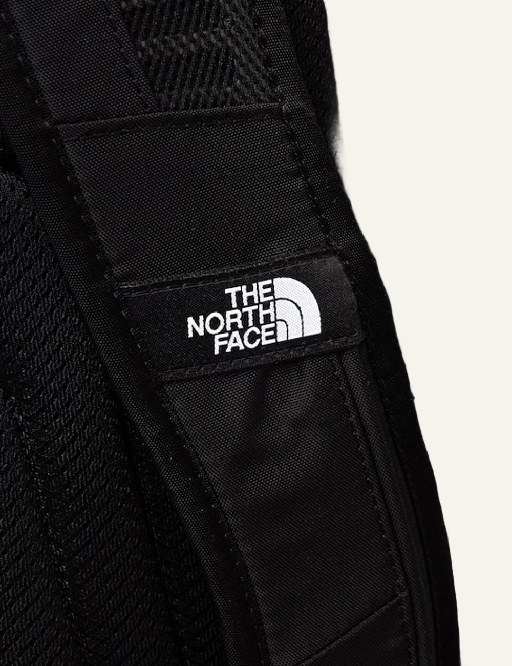 The North Face Hot Shot backpack purple grey logo detail