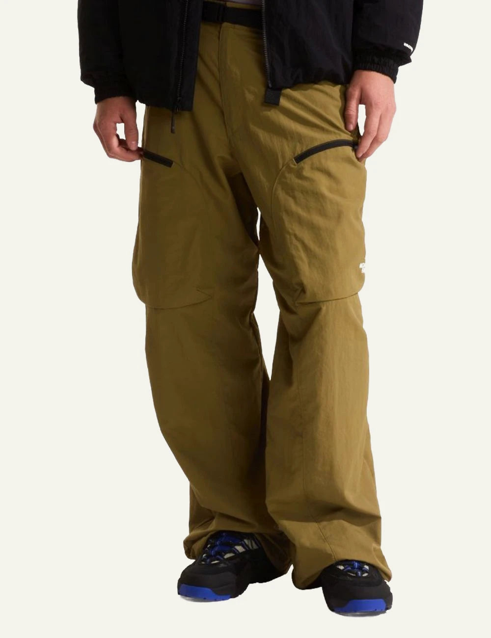 The North Face cargo nylon pants khaki relaxed fit zip pockets adjustable hem front model view