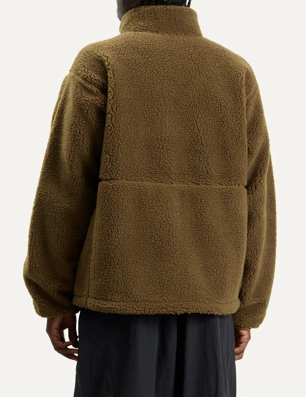 The North Face men's olive green Extreme Pile fleece jacket with textured sherpa fabric, high collar, front zipper and chest pocket back