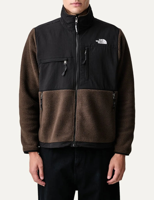 The North Face men's brown Retro Denali fleece jacket with black contrast panels, high collar, zip pockets and embroidered chest logo.
