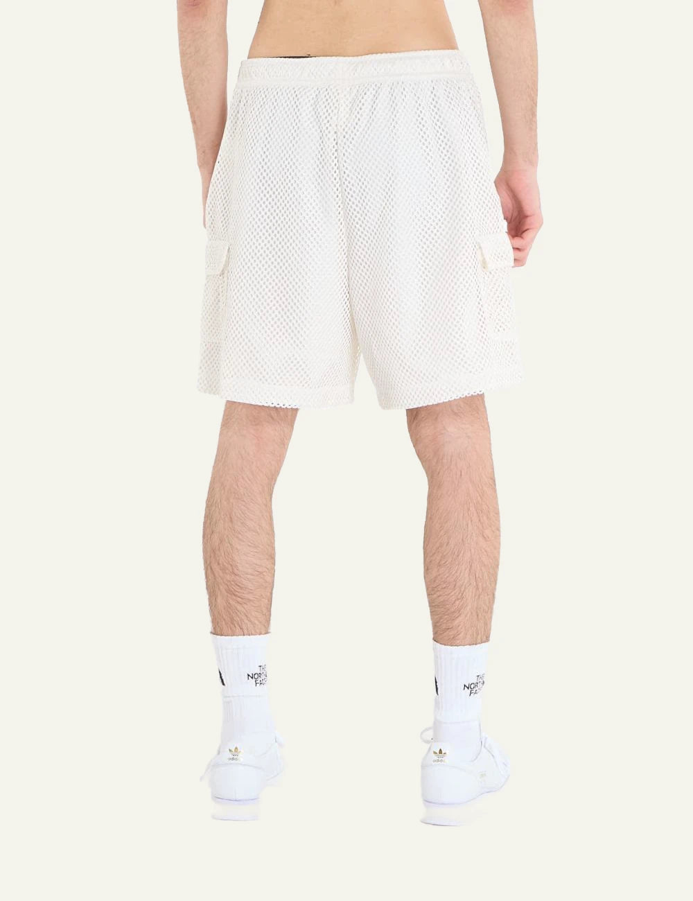 The North Face mesh shorts white elastic waist cargo pockets back view