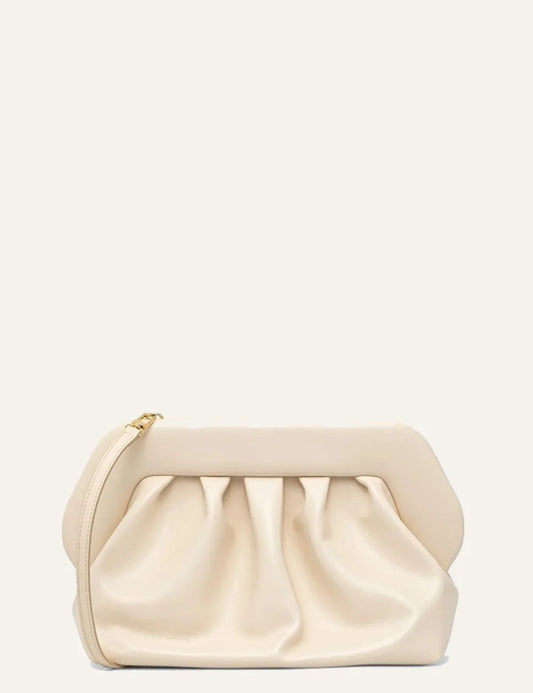 Themoirè clutch bag cream front view with wrist strap