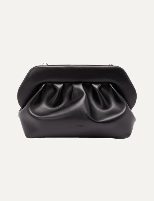 THEMOIRÈ women's black ruched clutch bag with smooth finish, magnetic closure, gold-tone hardware and detachable adjustable shoulder strap.
