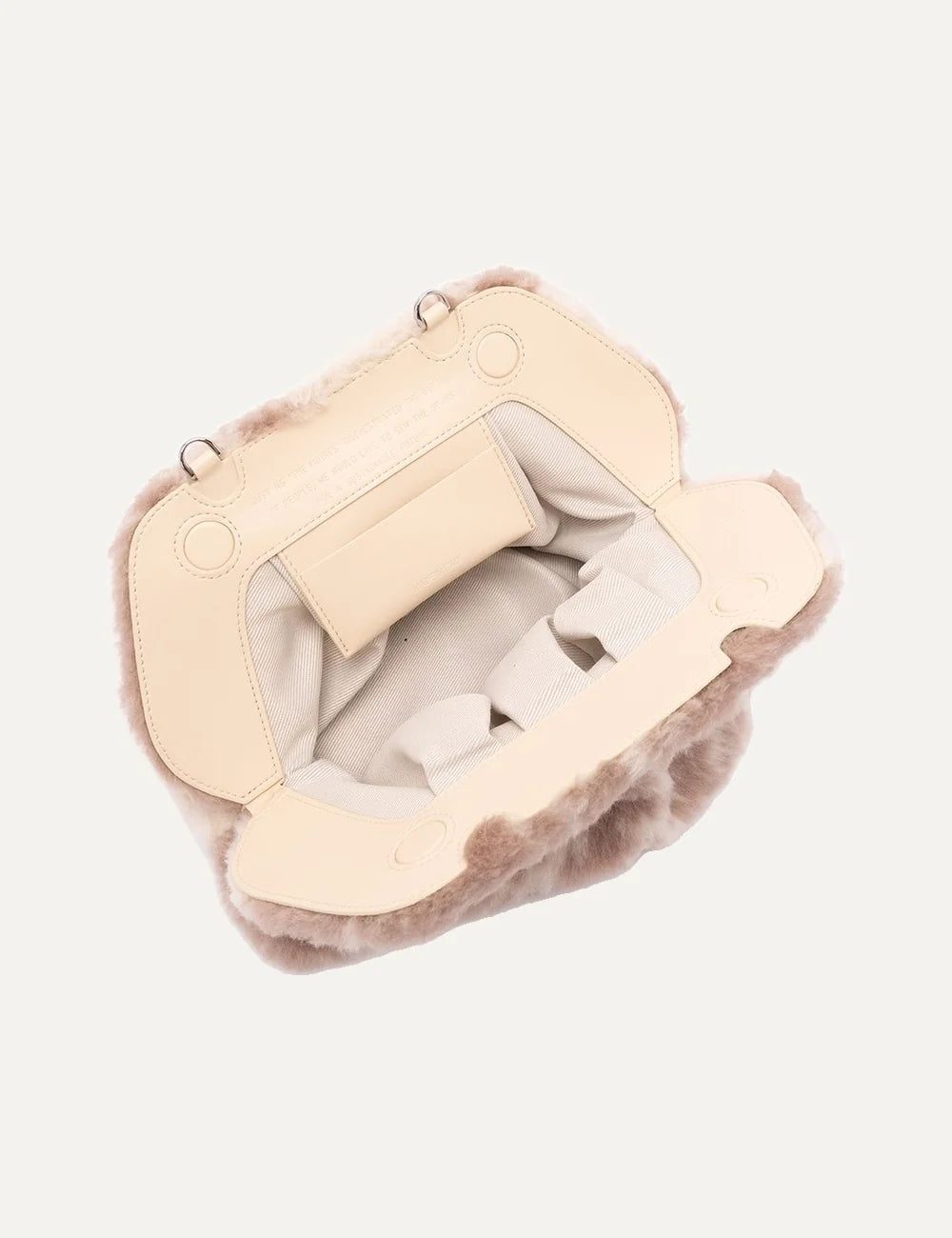 THEMOIRÈ women's fluffy handbag in beige and dusty pink tones, featuring a soft faux fur texture, gathered silhouette and metal hardware top