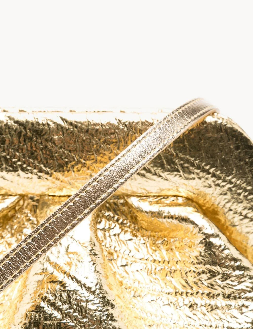THEMOIRÈ women's metallic gold hemp clutch bag with crinkled texture, ruched silhouette and detachable shoulder strap detail