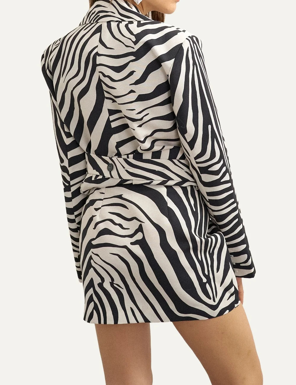 Topshop women's black and white zebra print mini skirt with slim fit and front hem slit back
