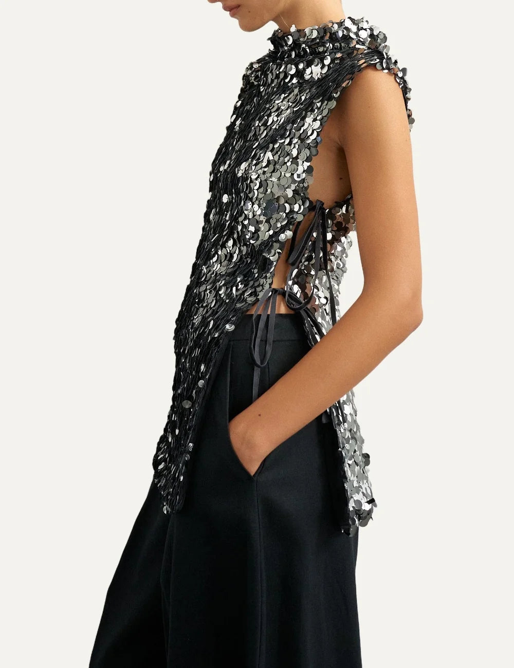 Topshop women's black sleeveless sequin top with silver and black round sequins, high neck and side tie details side