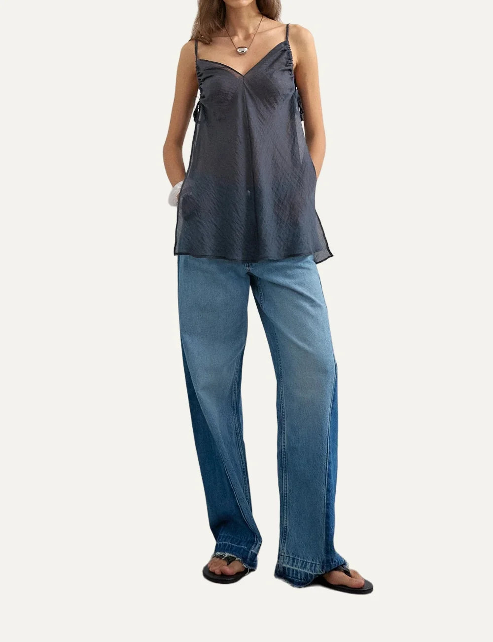 Topshop women's blue wide-leg jeans with contrasting dark blue side panels, faded wash and raw hems.