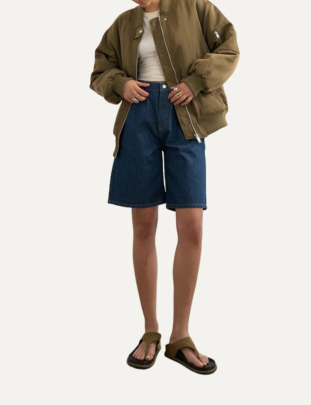 Topshop women's olive green oversized bomber jacket with ribbed collar, front zipper and sleeve zip pocket full body