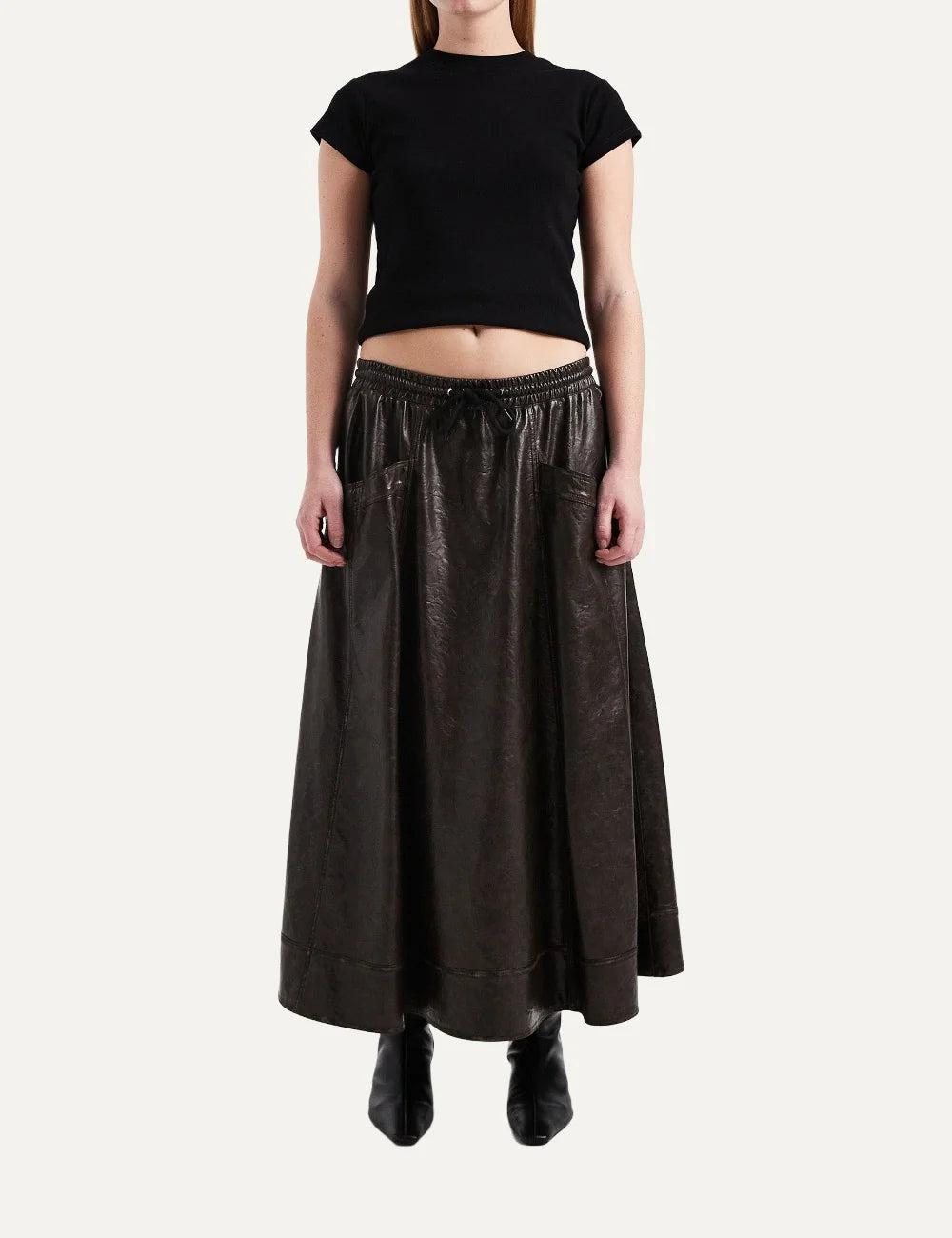 Topshop women's dark brown faux leather midi skirt with elastic drawstring waist, side pockets and flared silhouette.