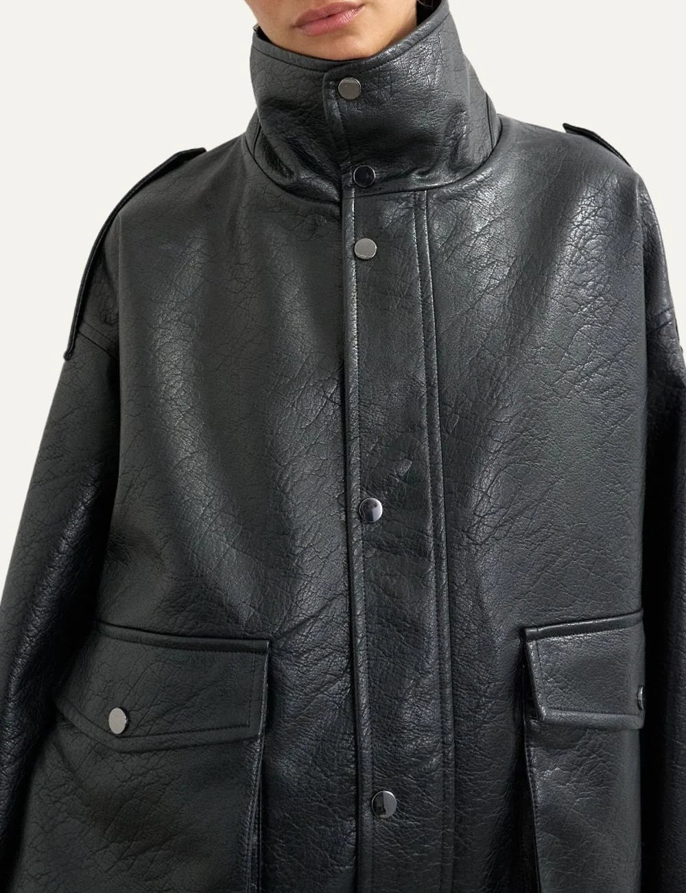 Topshop women's black faux leather bomber jacket with high stand collar, snap buttons and oversized flap pockets detail