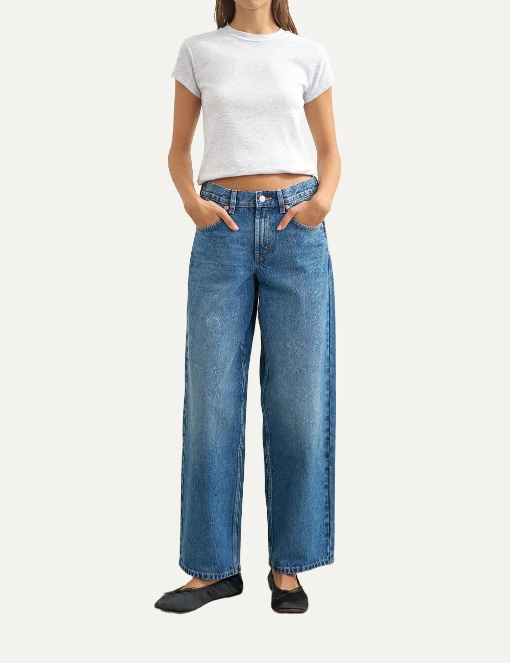 Topshop women's Cinch jeans in mid blue washed denim with a low-rise waist and relaxed straight legs full body