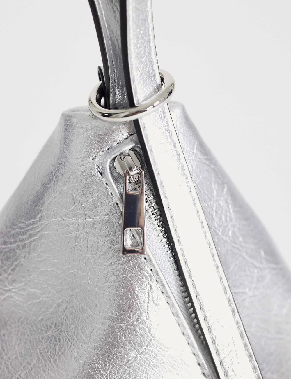 Topshop women's silver metallic triangular Arthur bag with textured finish, loop strap and side zipper detail