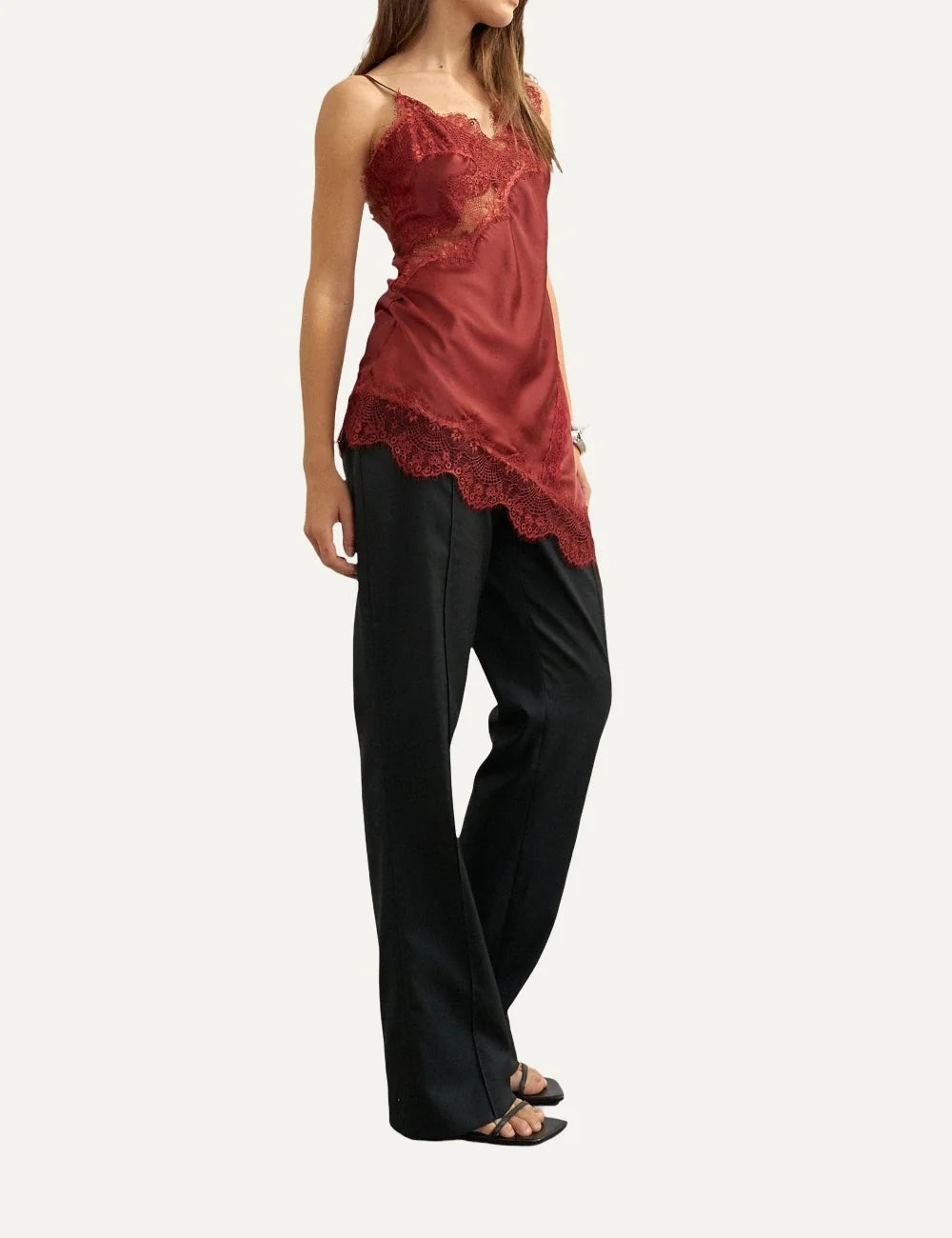 Topshop women's burgundy satin camisole top with lace-trimmed V-neckline, thin straps and asymmetric lace hem.