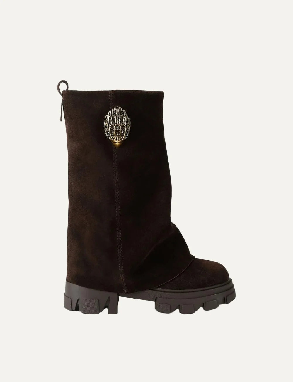 Kurt Geiger London women's Stomp Foldover Crystal boots in dark brown suede with crystal-embellished gold eagle detail and chunky lug sole.