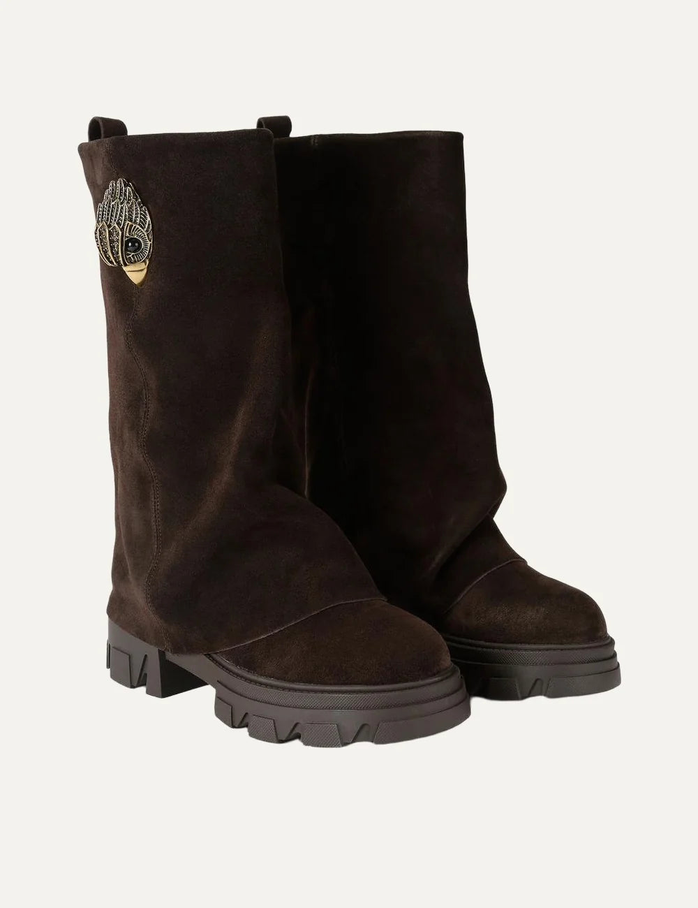 Kurt Geiger London women's Stomp Foldover Crystal boots in dark brown suede with crystal-embellished gold eagle detail and chunky lug sole front