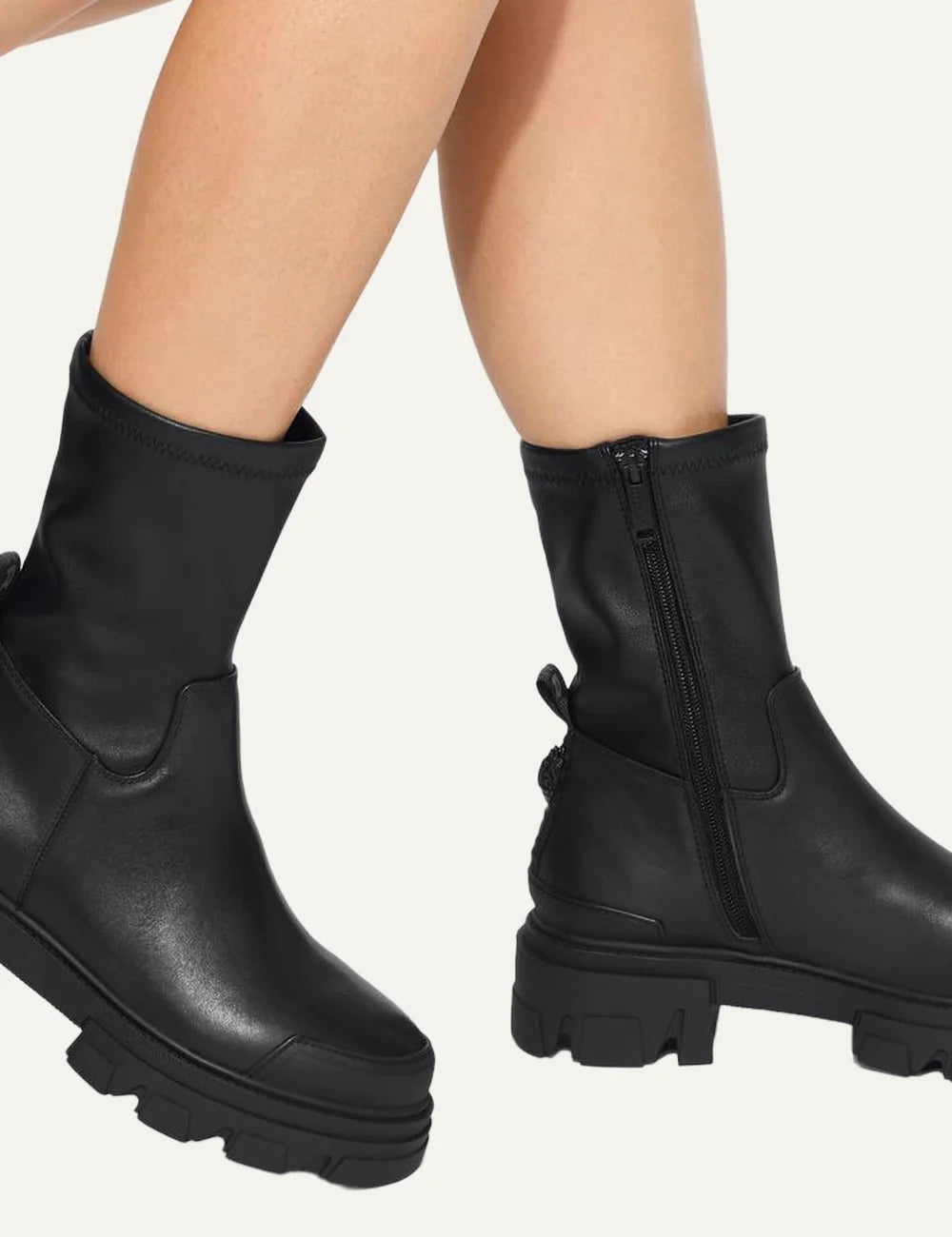 Kurt Geiger London women Stomp Sock black leather ankle boots with chunky sole model