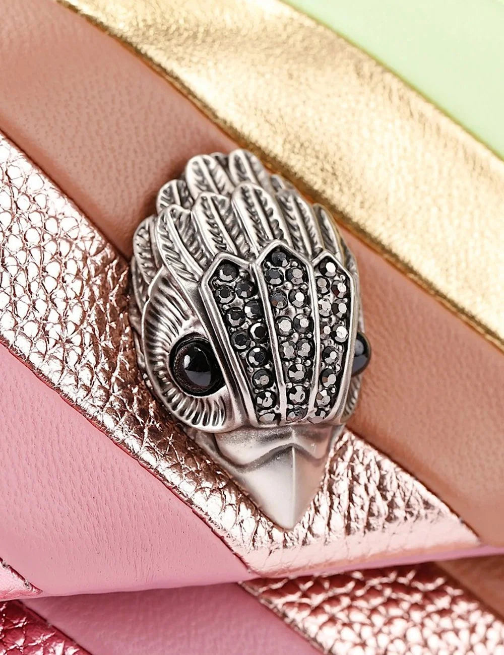 Kurt Geiger signature eagle head closure rhinestone detail close-up